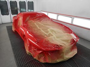 red car in painting room